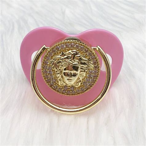 versace pacifier price|Versace baby sets.